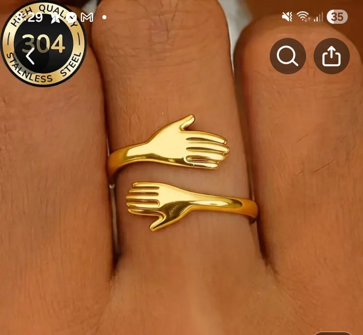 Gold hands Symbol Ring